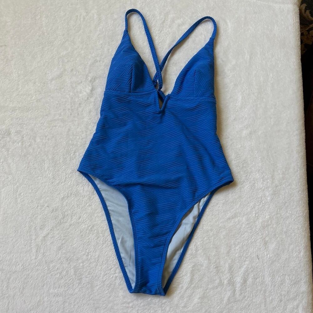 Blue one piece swimsuit ribbed texture open back cross cross straps high leg